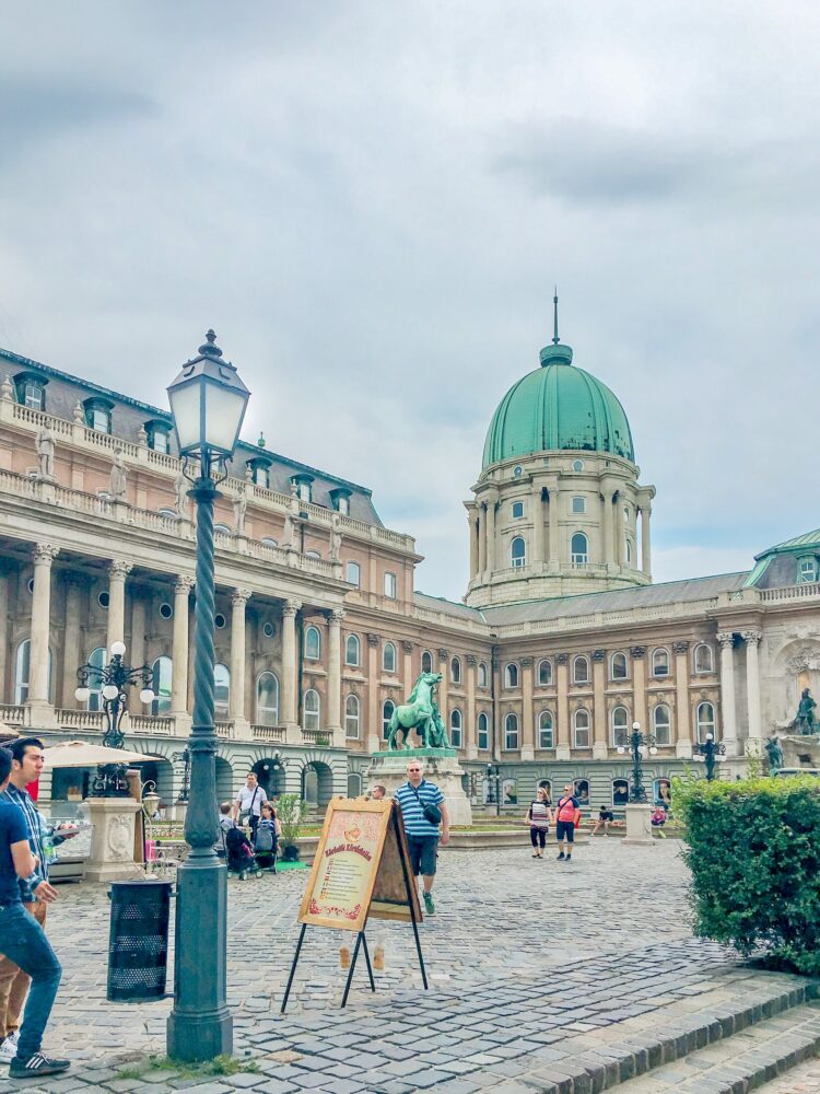 Budapest travel guide featuring what to see, do, eat and drink in Budapest!

Pictured here: Buda Castle