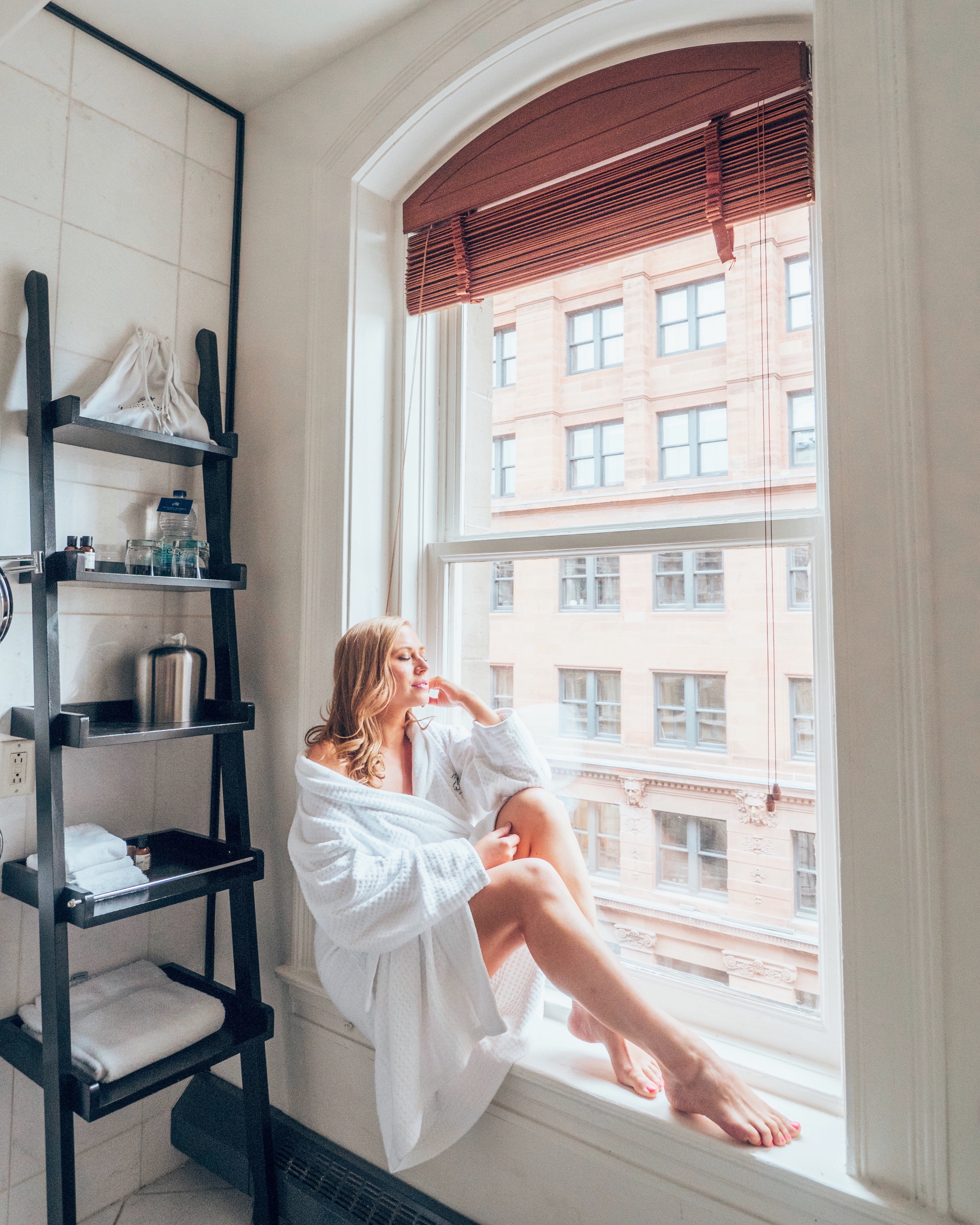 Where to stay in downtown Montreal: the Hotel Place D'Armes. This 5 star luxury hotel is the perfect place to stay in Montreal.

Pictured here: Guest restroom with view of old Montreal

Click the photo for the full review with photos