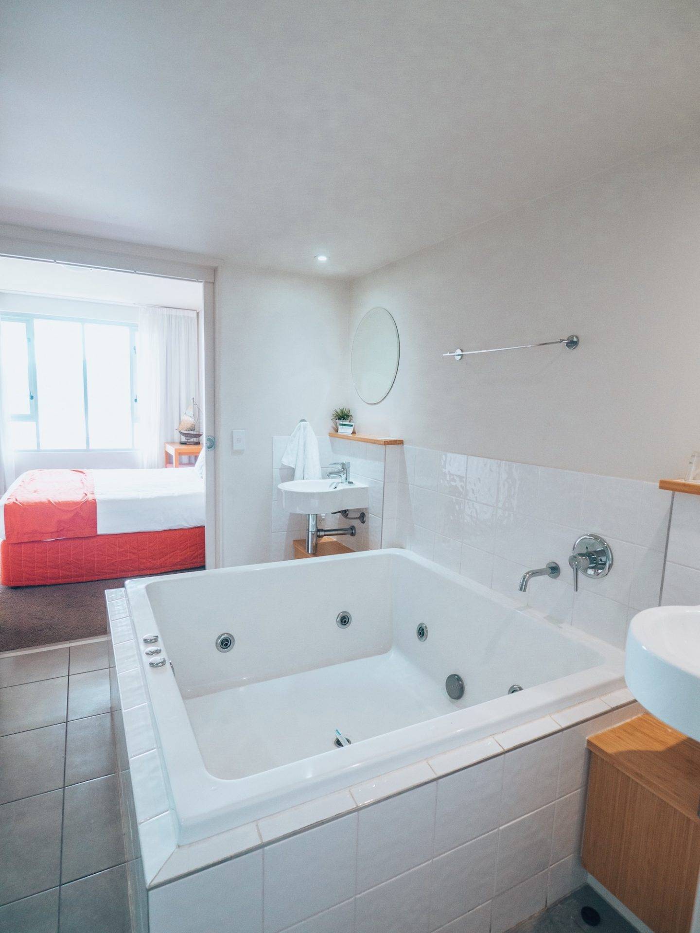 The spacious rooms at Peppers Airlie Beach were one of the reasons we loved staying at this resort. Just look at the size of this bathroom and bathtub in our suite!