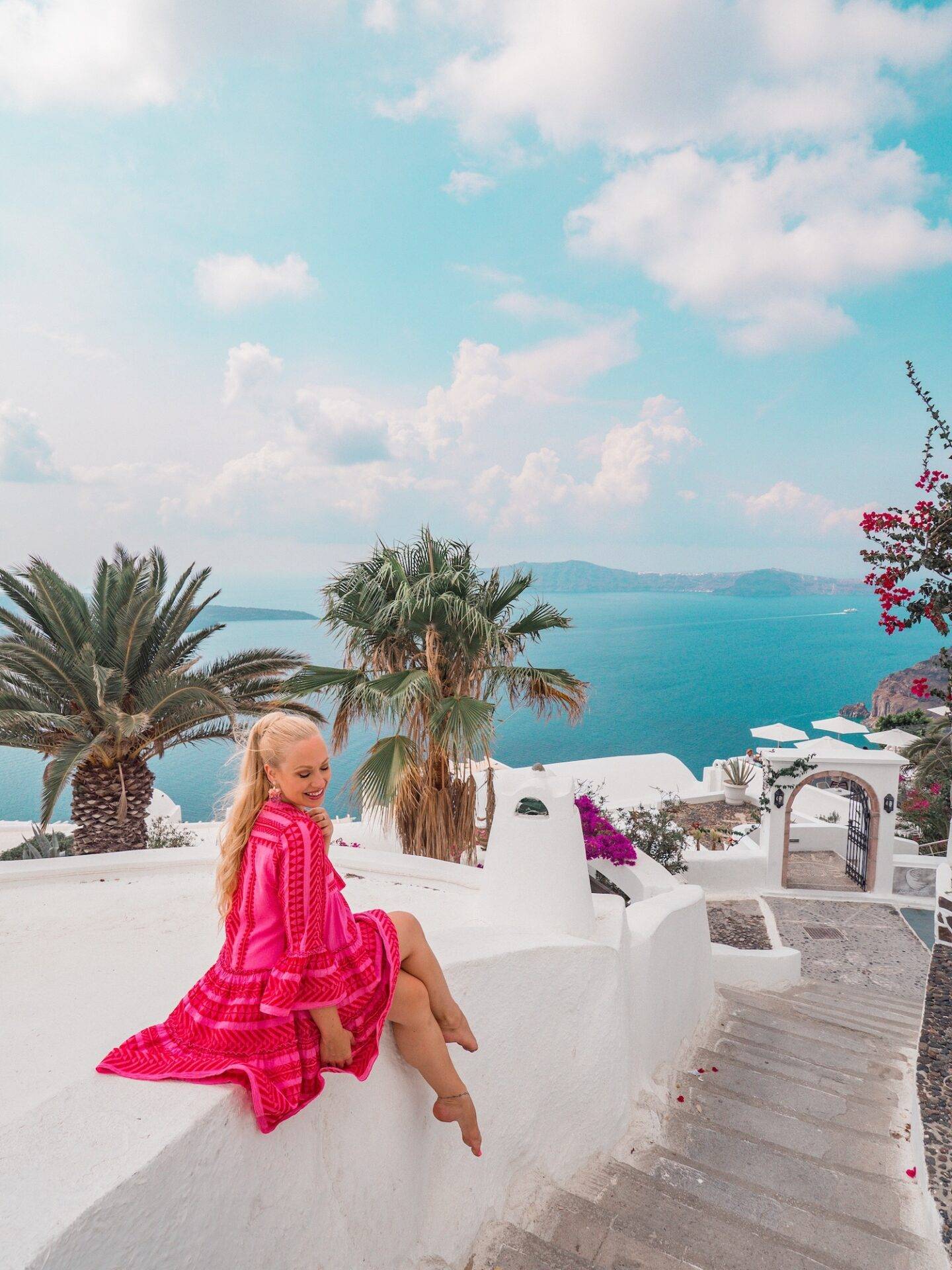 The best photo spots and most instagrammable places in Santorini: Unique hotel entrances of Fira. Click the photo to see the rest of my list of the best instagram photo spots in Santorini!