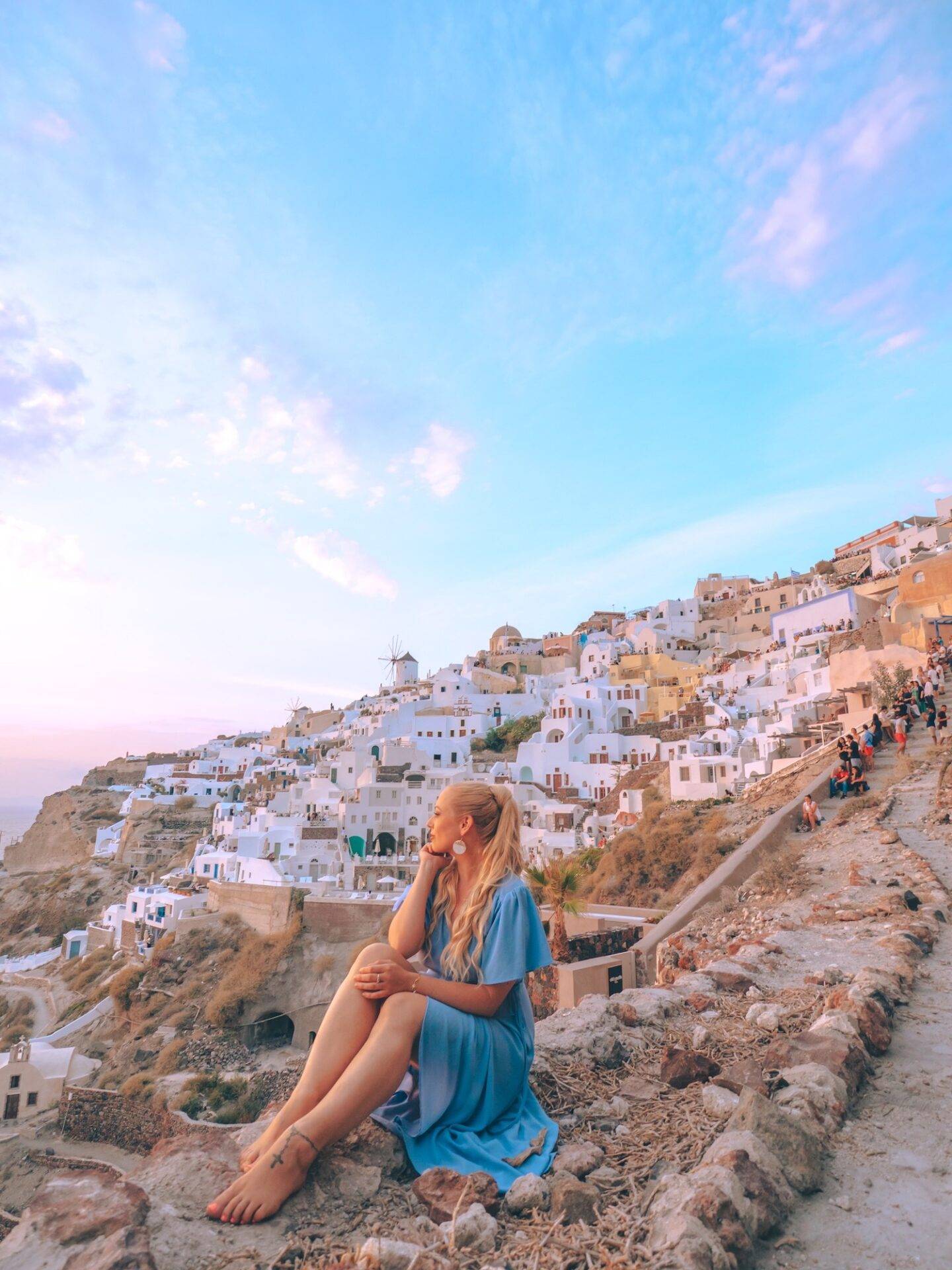 The Best Photo spots and Most instagrammable places in Santorini: Sunset at Byzantine Castle. Click the photo to see the rest of my list of the best instagram photo spots in Santorini!