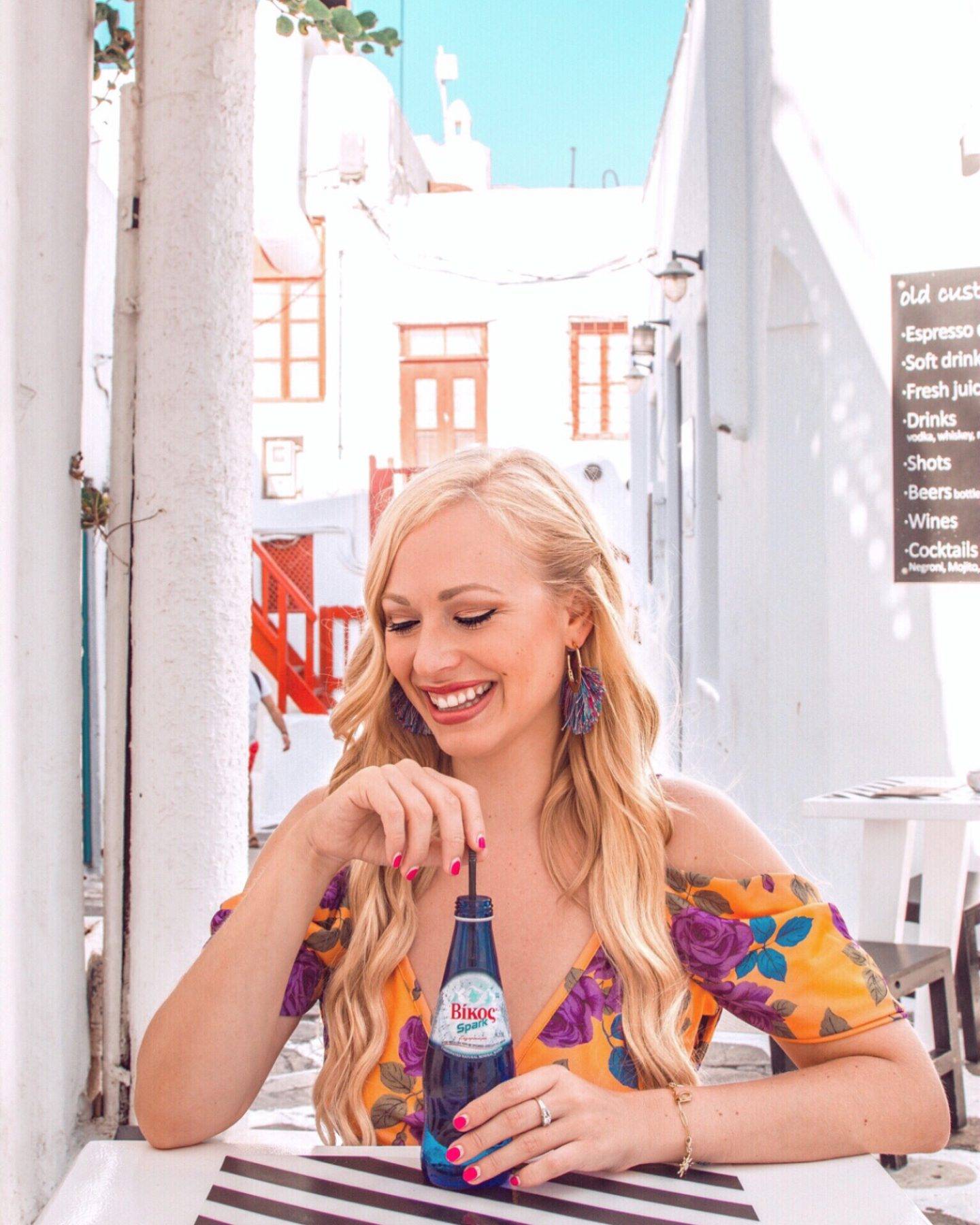 Enjoying some sparkling water in between shooting at Mykonos top instagrammable photo spots. Click the photo to see my full list of the most instagrammable places in Mykonos! 