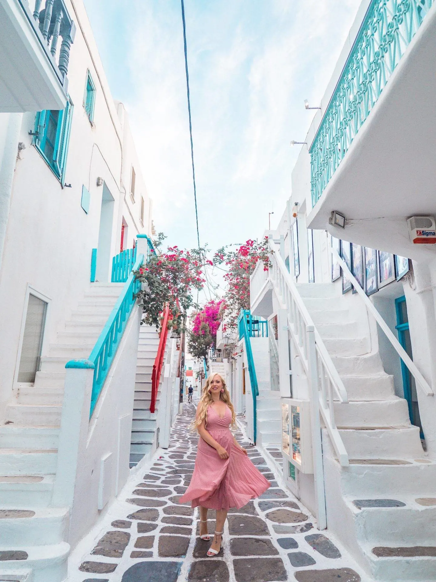 The most instagrammable places in Mykonos - the tiny cobble streets of Old Town Mykonos. Click the photo to see the rest of my list of the most instagrammable places in Mykonos! 