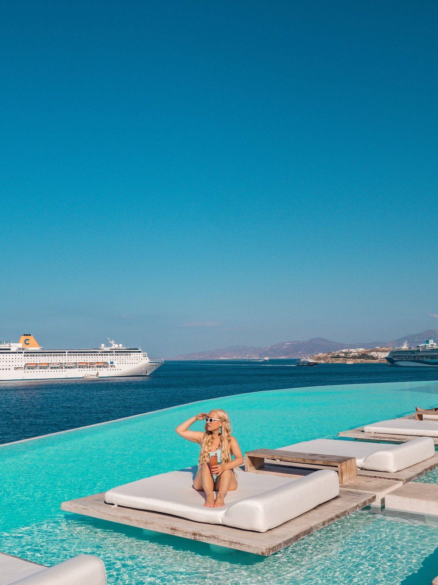 Cavo Tagoo is one of the most instagrammable places in Mykonos. Click the photo to see the rest of my list of the most instagrammable places in Mykonos! 