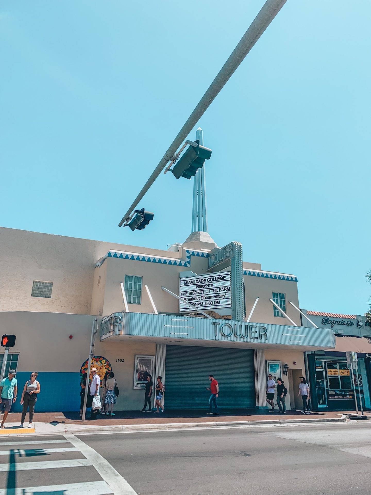 How to spend 1 perfect day in Little Havana, Miami. A complete guide on what to see and do, which restaurants to dine at, bars to visit, Cuban treats to try and more. If you're headed to Little Havana for the day you'll definitely want to read this guide! Pictured here: Little Havana's iconic tower theatre