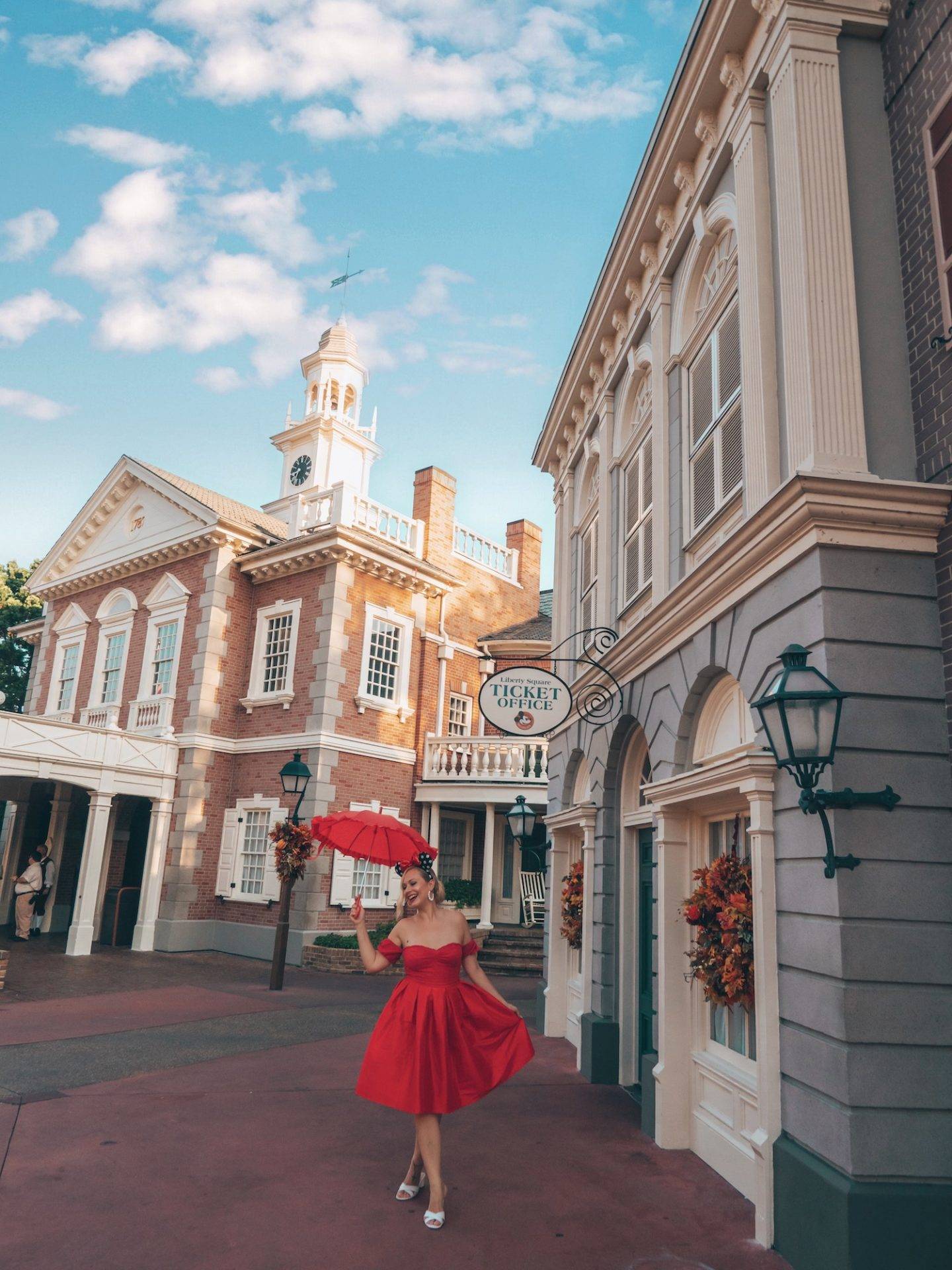 Mary Poppins vibes in Liberty Square at Disney World. Click the photo for a complete guide on how to get the perfect photo at Disney! Includes a list of all the top Disney World photo spots. via www.kirstenwendlandt.com
