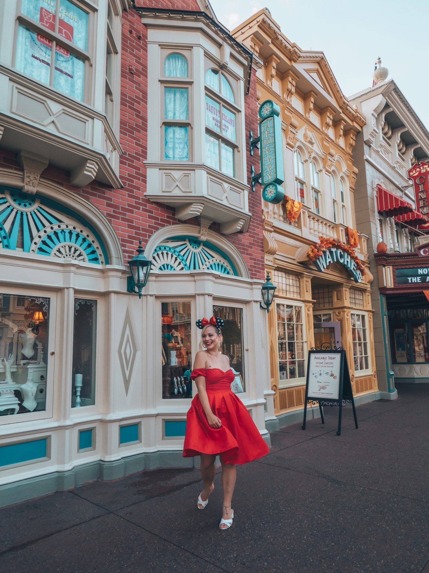Twirling through Main Street USA in Disney World. Click the photo for a complete guide on how to get the perfect photo at Disney! Includes a list of all the top Disney World photo spots. via www.kirstenwendlandt.com