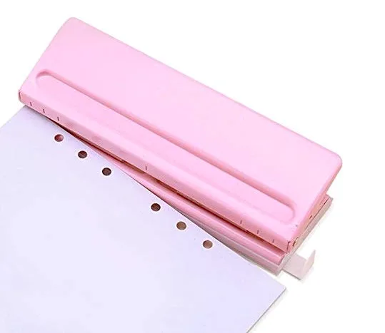 A pink hole puncher is the perfect way to brighten up your office space.
