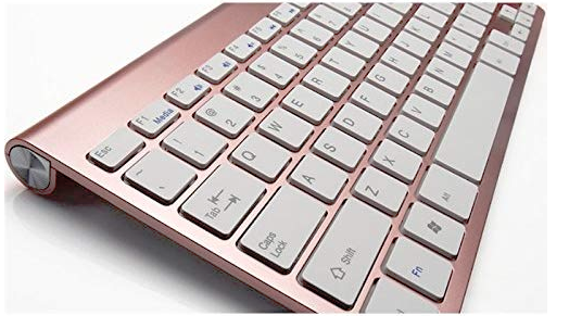 Rose gold office supplies to brighten your office space - rose gold keyboard