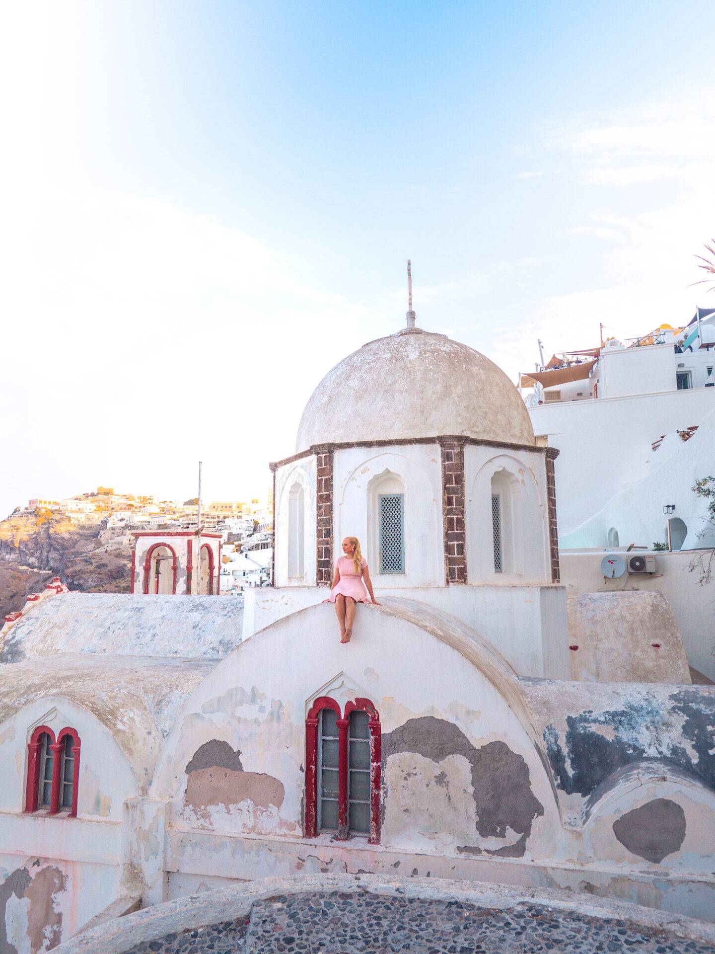 The best photo spots and most instagrammable places in Santorini: Church of St.John the Theologian in Fira. Click the photo to see the rest of my list of the best instagram photo spots in Santorini!
