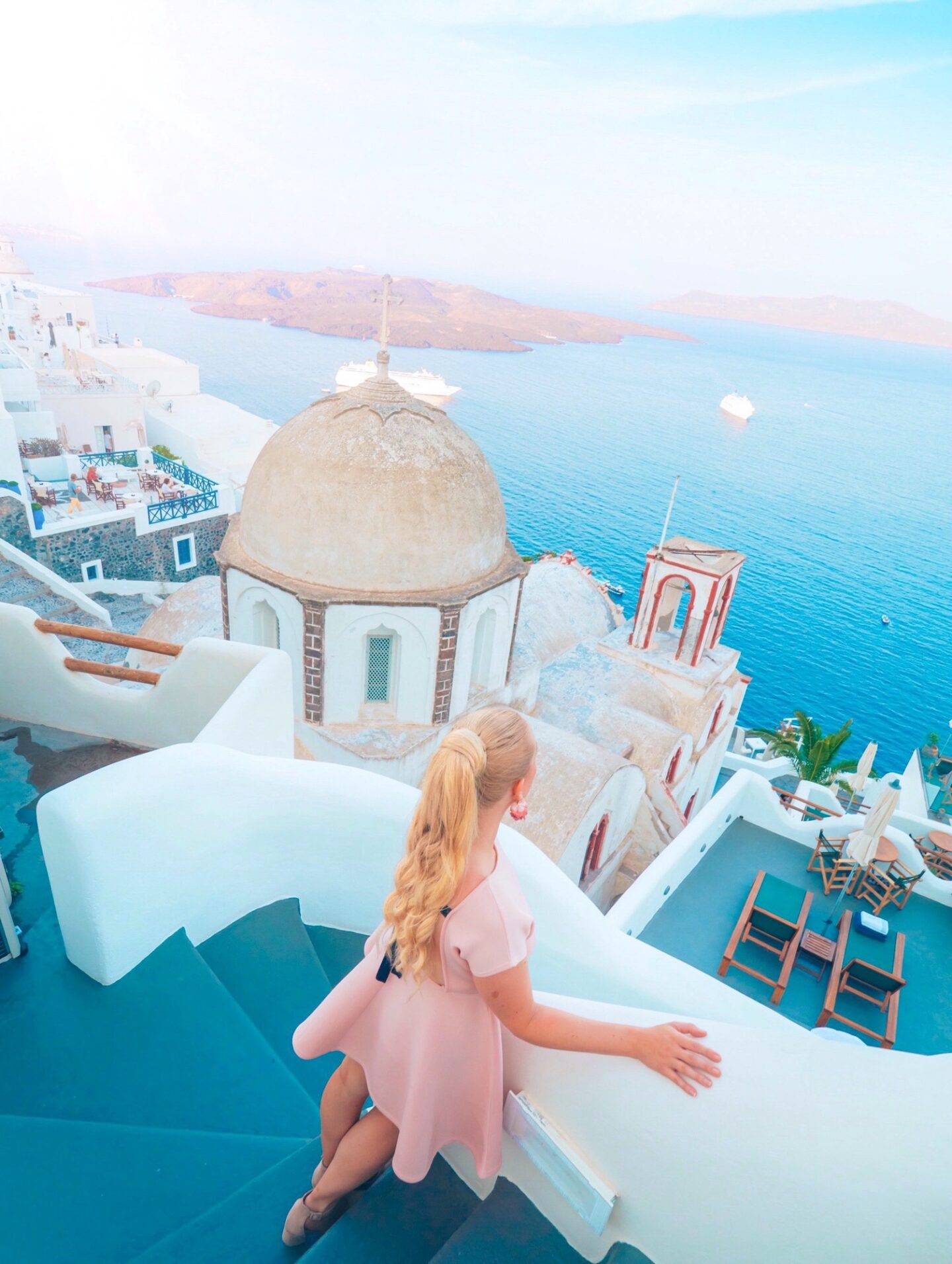The best photo spots and most instagrammable places in Santorini: Church of St.John the Theologian in Fira. Click the photo to see the rest of my list of the best instagram photo spots in Santorini!