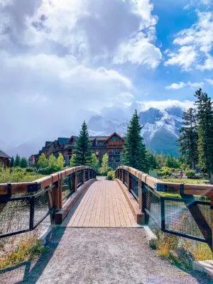 Visiting Banff National Park soon? Don't miss this guide of the 50 best things to in Banff for every kind of traveler! I recently spent 8 days exploring the area and took notes along the way so I could write you the most comprehensive guide possible. This guide includes all the top attractions, hikes, restaurants, and sights you definitely won't want to miss when you visit Banff National Park. I also include any tips you might need when visiting the area! Pictured here: Stroll along Policeman's Creek Boardwalk in Canmore