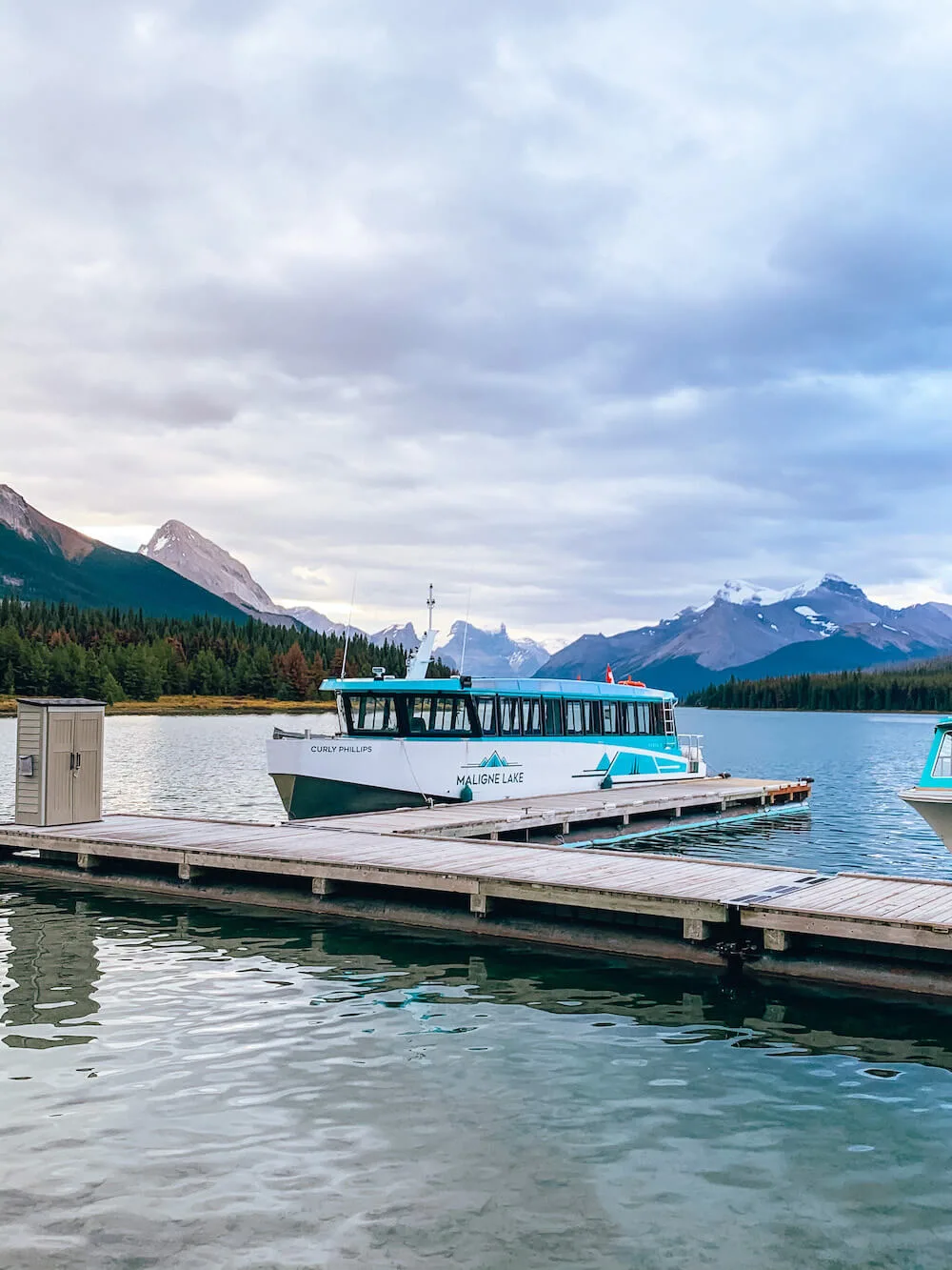 Planning a trip to Jasper National Park soon? Here's a local's guide to some of the best things to do in Jasper. From hikes and trails to adventure sports, family friendly excursions, dining experiences and more. You won't want to miss this guide of the best things to do and places to see in Jasper. Pictured here: Maligne Lake Cruise