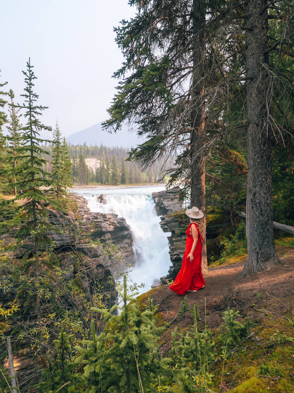 Planning a trip to Jasper National Park soon? Here's a local's guide to some of the best things to do in Jasper. From hikes and trails to adventure sports, family friendly excursions, dining experiences and more. You won't want to miss this guide of the best things to do and places to see in Jasper. Pictured here: Athabasca Falls