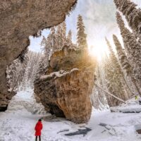 Experiencing the wonders of the Johnston Canyon ice walk is something you absolutely have to do when visiting Banff during the winter months. This guide has everything you need to know before hiking Johnston Canyon in winter. It includes tips on everything from how to prepare, what to wear, special equipment you'll need, how to find the secret cave and more!