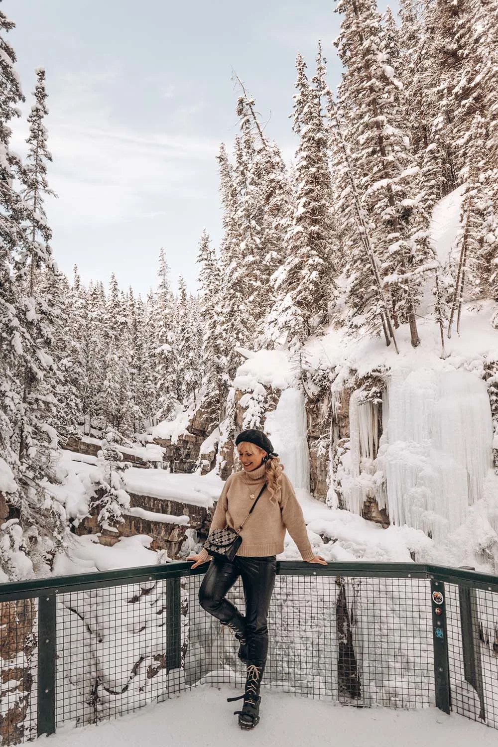 Banff is absolutely incredible. Although most people visit Banff when the weather is warmer, it's absolutely magical to visit in winter. Here's a local's guide to some of the best things to do in in Banff in winter. From hikes and trails to winter sports, family friendly excursions, dining experiences and more. You won't want to miss this guide that will surely convince you to add Banff in winter to your travel bucket list. Pictured here: Johnston Canyon upper falls trail