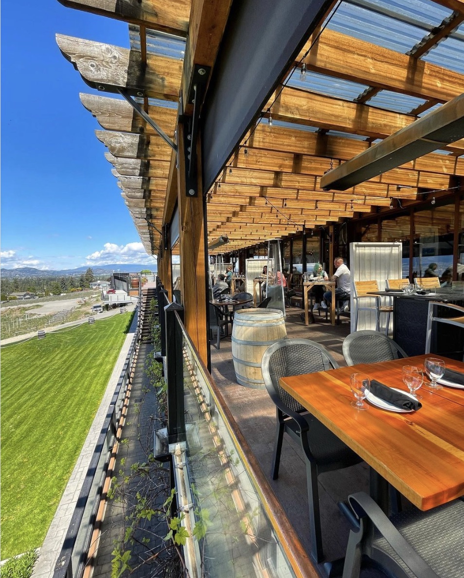 Looking for the best wineries in Kelowna for lunch? This guide is for you! Here's a list of the best Kelowna wineries with restaurants to enjoy an amazing lunch with wine in the sun. Pictured here: Summerhill Pyramid Winery