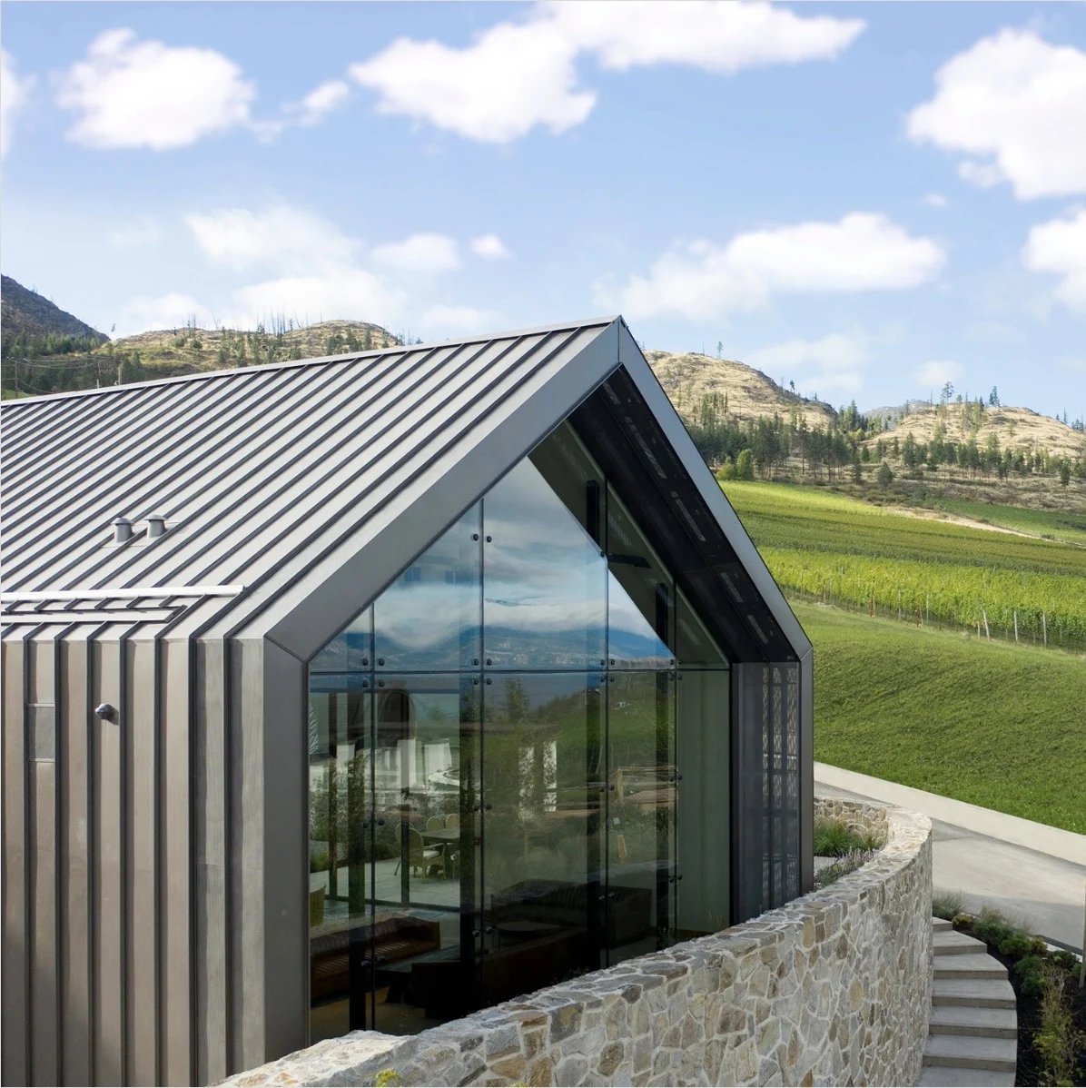Looking for the best wineries in Kelowna for lunch? This guide is for you! Here's a list of the best Kelowna wineries with restaurants to enjoy an amazing lunch with wine in the sun. Pictured here: CedarCreek Estate Winery