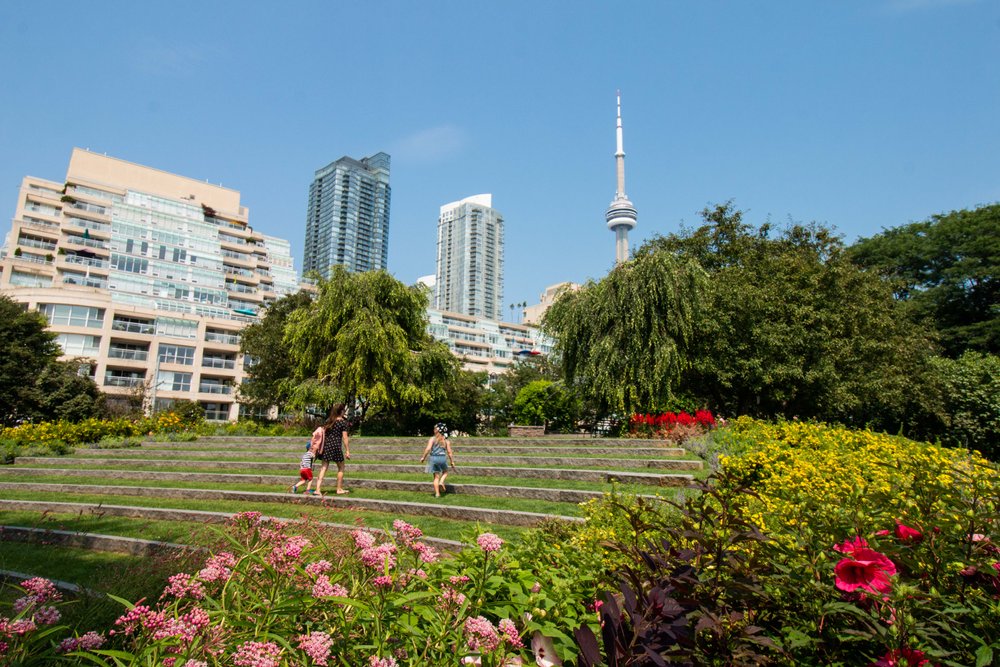 Looking for an incredible place to enjoy your next picnic in Toronto? This guide features some of the best picnic spots in Toronto from a local's perspective. Whether you're looking to picnic in a park, to spend your day sunning and snacking on a beach, prefer a garden hang, or want to check out a more unique destination, this guide has all of the best picnic spots for you to choose from. Pictured here: Toronto Music Garden