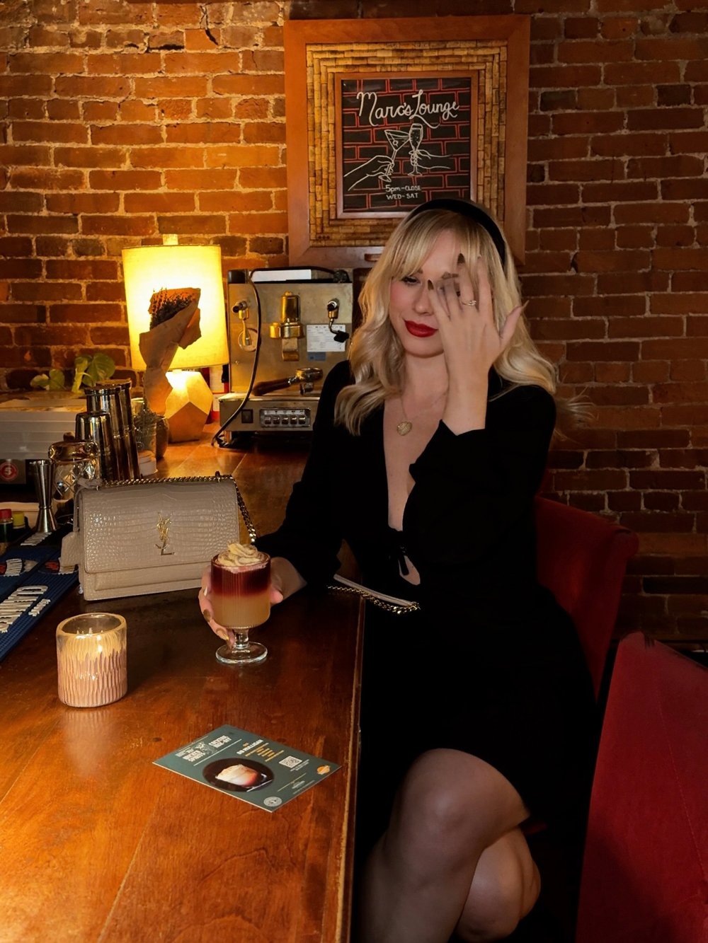 Enjoying a fall cocktail at The Brickhouse Kitchen & Bar in Charlottetown, PEI &mdash; cozy lighting and autumn-inspired drinks.