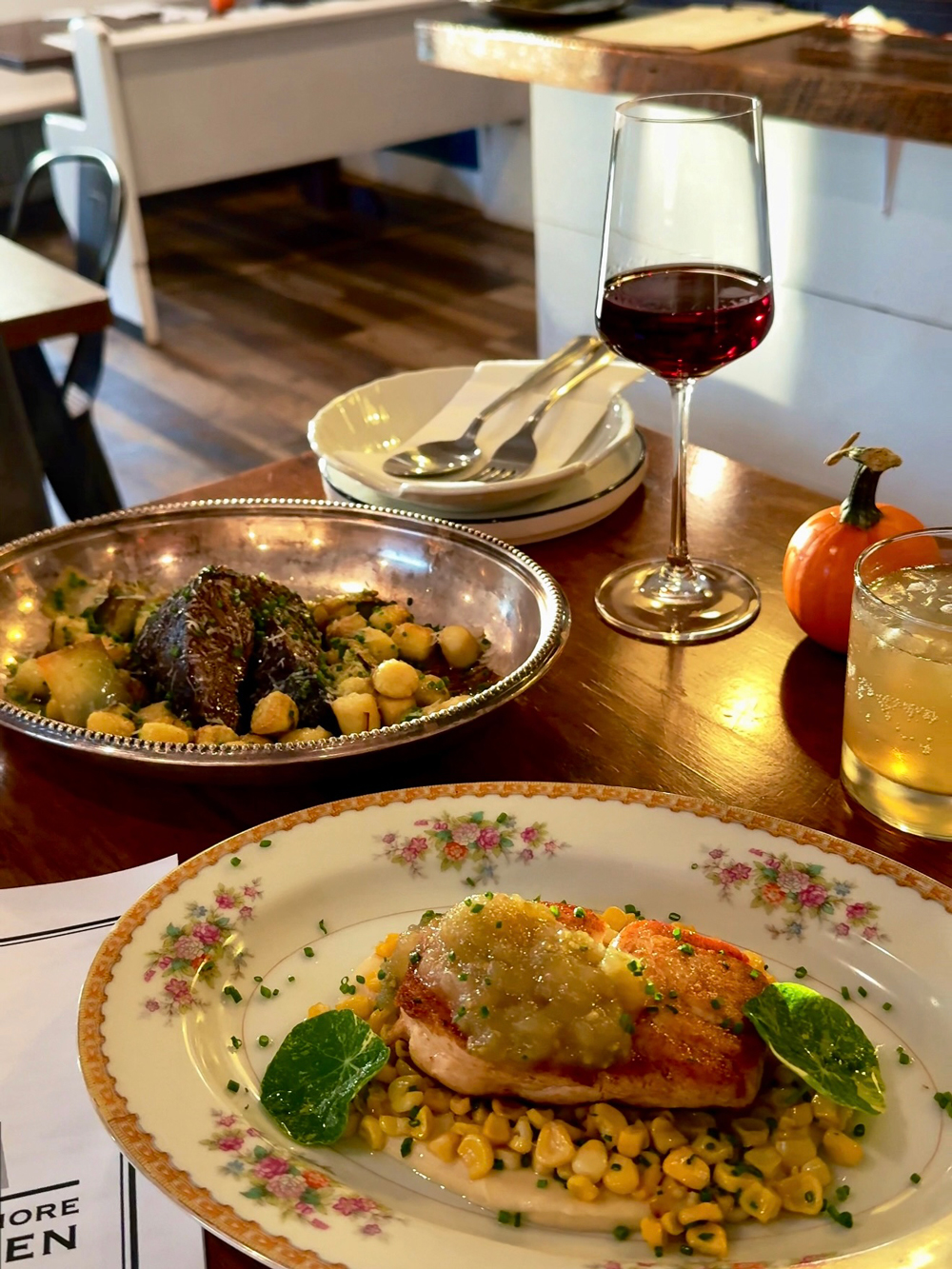 Seasonal dinner at North Shore Canteen restaurant near Charlottetown, PEI &mdash; fall flavours with wine and pumpkin d&eacute;cor.